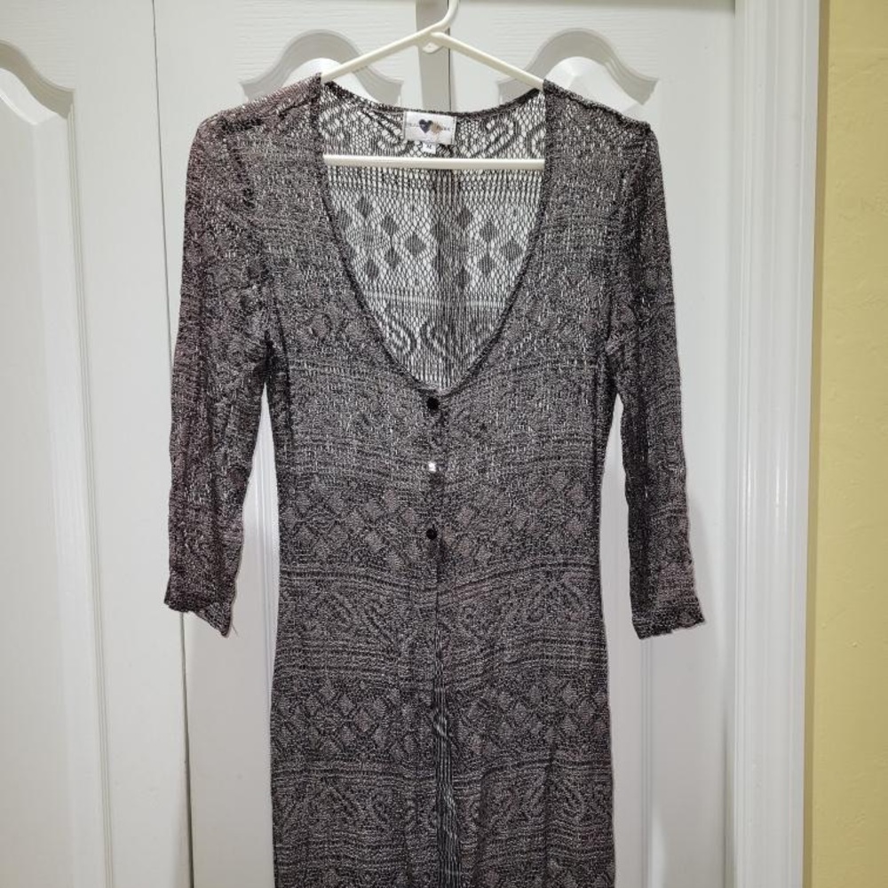 Long lacy knit statement sweater with 3 button front